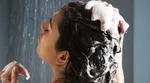 A person washing their hair